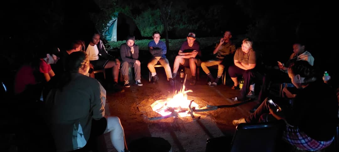 Interns having a bonfire night