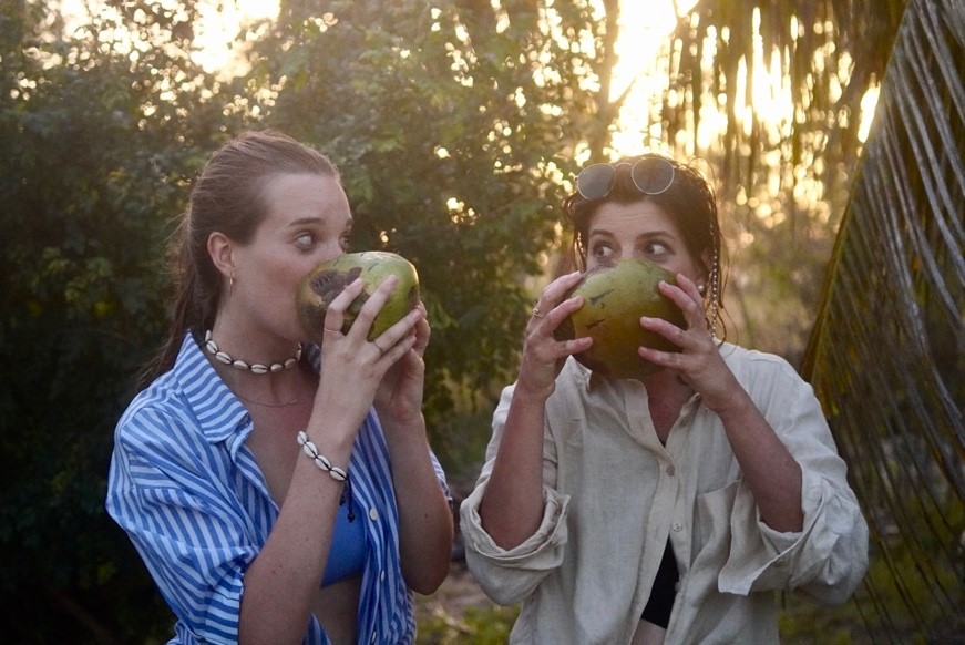 Eleanora and I drinking coconut water in Tofo 