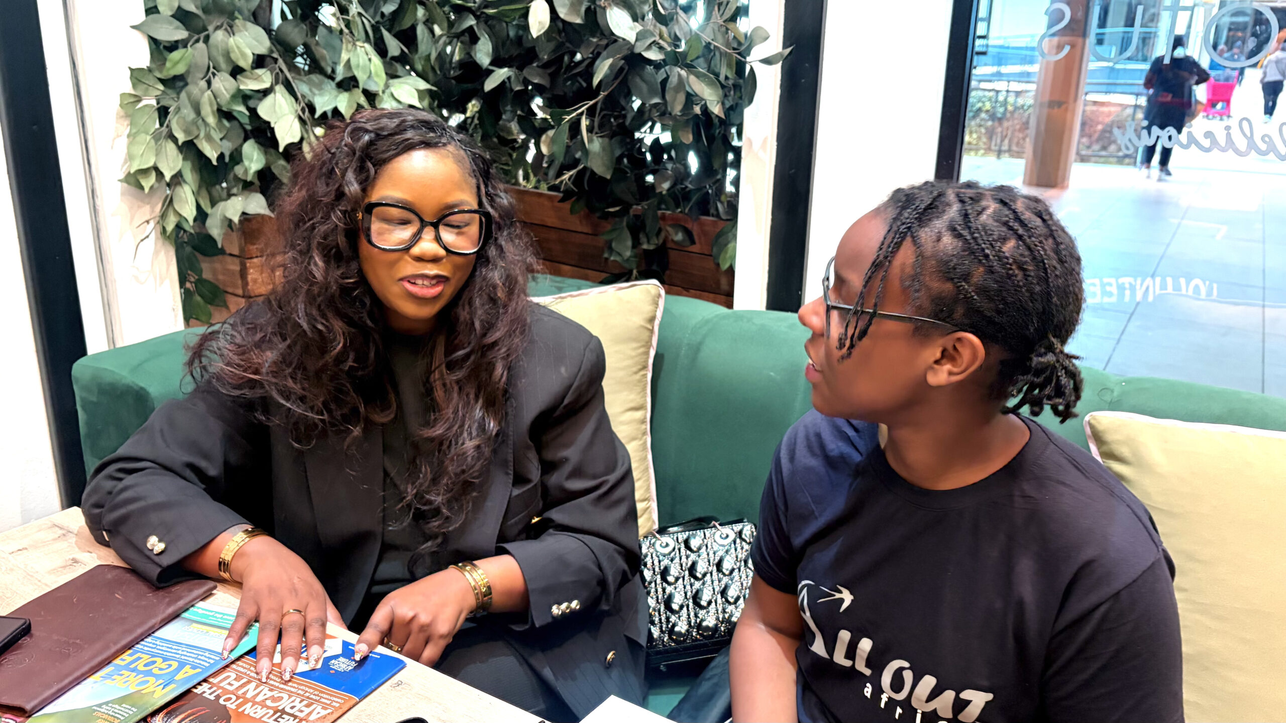 Hilda Najjumba conducting an interview during her journalism internship in Eswatini
